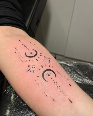 Fine line geometric moon and pattern forearm tattoo in London, GB. Beautiful and illustrative design.