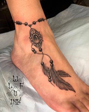 Feather Tattoo on the Foot by Elena Wolf done at Wolf Wood Ink (Heilberscheid-Germany)
