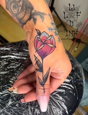 Rose Tattoo on thumb by Elena Wolf done at Wolf Wood Ink (Heilberscheid-Germany)
