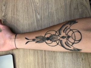 My first tattoo : A Quetzal mixed with a phoenix 
