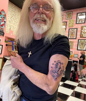 Carl’s first tattoo at the crisp age of 70.