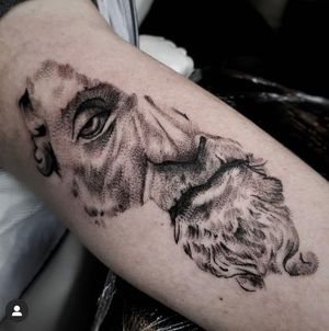 Get a bold blackwork tattoo of a man with a beard on your forearm in Los Angeles. Add a touch of masculinity to your ink collection.