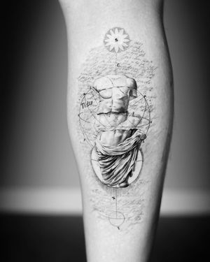 Get a stunning fine line and illustrative tattoo of a statue and globe on your forearm in Los Angeles. Show off your love for travel and art!