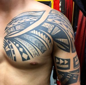 Polynesian inspired tribal chest to half sleeve by Anna Waychoff 