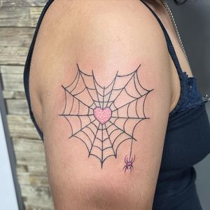 Beautiful illustrative design on upper arm by Michaelle Fiore featuring a spider, heart, and spider web.