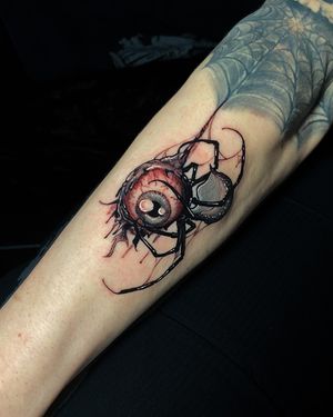 Unique new school illustration of a spider and eye design by Jethro Wood, perfect for your forearm.