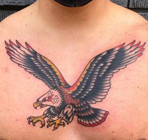 Traditional chest eagle tattoo by Kyle Jeffas