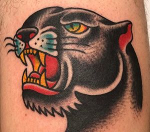 Traditional panther head tattoo by Kyle Jeffas
