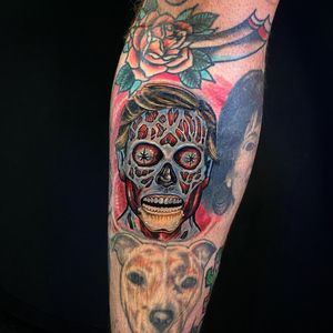 Vibrant and detailed neo-traditional tattoo of a zombie skull on the lower leg by artist Jethro Wood.