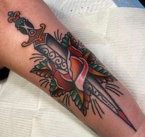 Traditional dagger and rose by Eddie Peralta