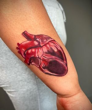 Capture your heart with this new school design by tattoo artist Michaelle Fiore. Perfect for the forearm.