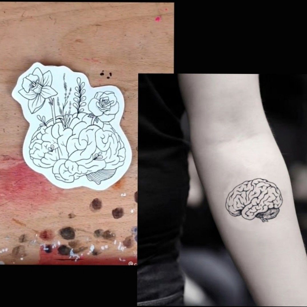 Minimalist skull and brain tattoo on the wrist.