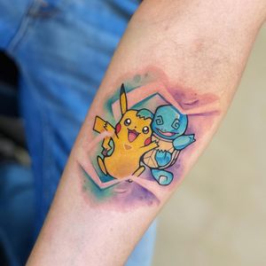 Get a colorful new school tattoo featuring Pikachu, Squirtle, and a turtle. Expertly designed by the talented artist Artemis.