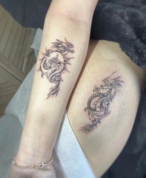 Experience the delicate beauty of a dragon and flower design on your forearm, expertly crafted by Polina in a fine line, illustrative style.