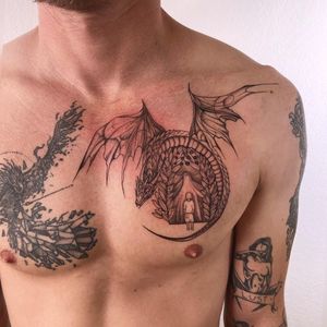 A beautiful fine-line and illustrative tattoo featuring a dragon, flower, and kid, expertly done by Polina on the chest.