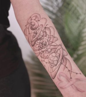 Elegant illustration of a planet in dotwork and fine line style, by the talented artist Polina. Perfect for the forearm.