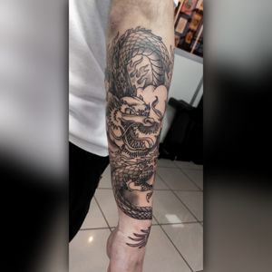 Dragon tattoo hecho en Sagrada tinta tattoo