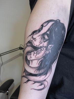 Blackwork dark horror tattoo