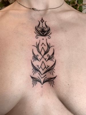 Symbolic magic flower tattoo