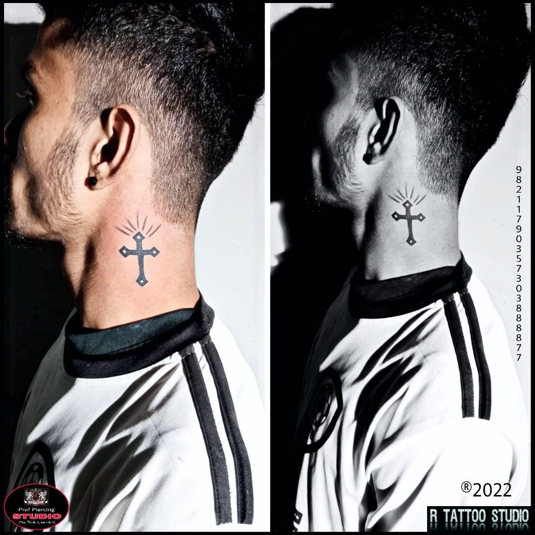 Tattoo uploaded by Fernando Bolaños • #necktattoo #cross #religious  #blackandgrey #Black #wings • Tattoodo