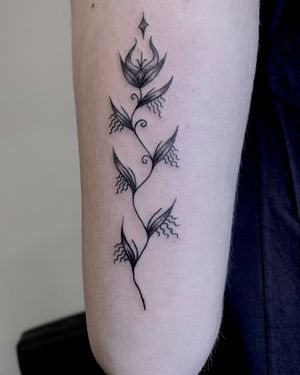 Custom magic flower tattoo