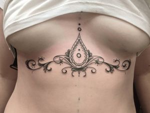 Elegant blackwork design with intricate filigree patterns, beautifully crafted by Jose Cordova.