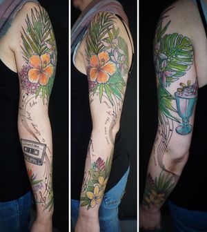 Experience the beauty of nature with this vibrant and artistic illustrative watercolor flower sleeve tattoo. Created by the talented artist Aygul.