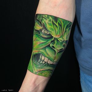 Get ready to unleash your inner strength with this vibrant new school style Hulk tattoo by Marie Terry.