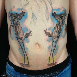 Marie Terry brings the majestic beauty of a horse to life in vibrant new school style on your stomach.