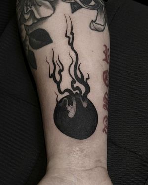 Embrace the power of the fireball with this mesmerizing Japanese blackwork tattoo on your forearm. Designed by the talented artist Luca Salzano.