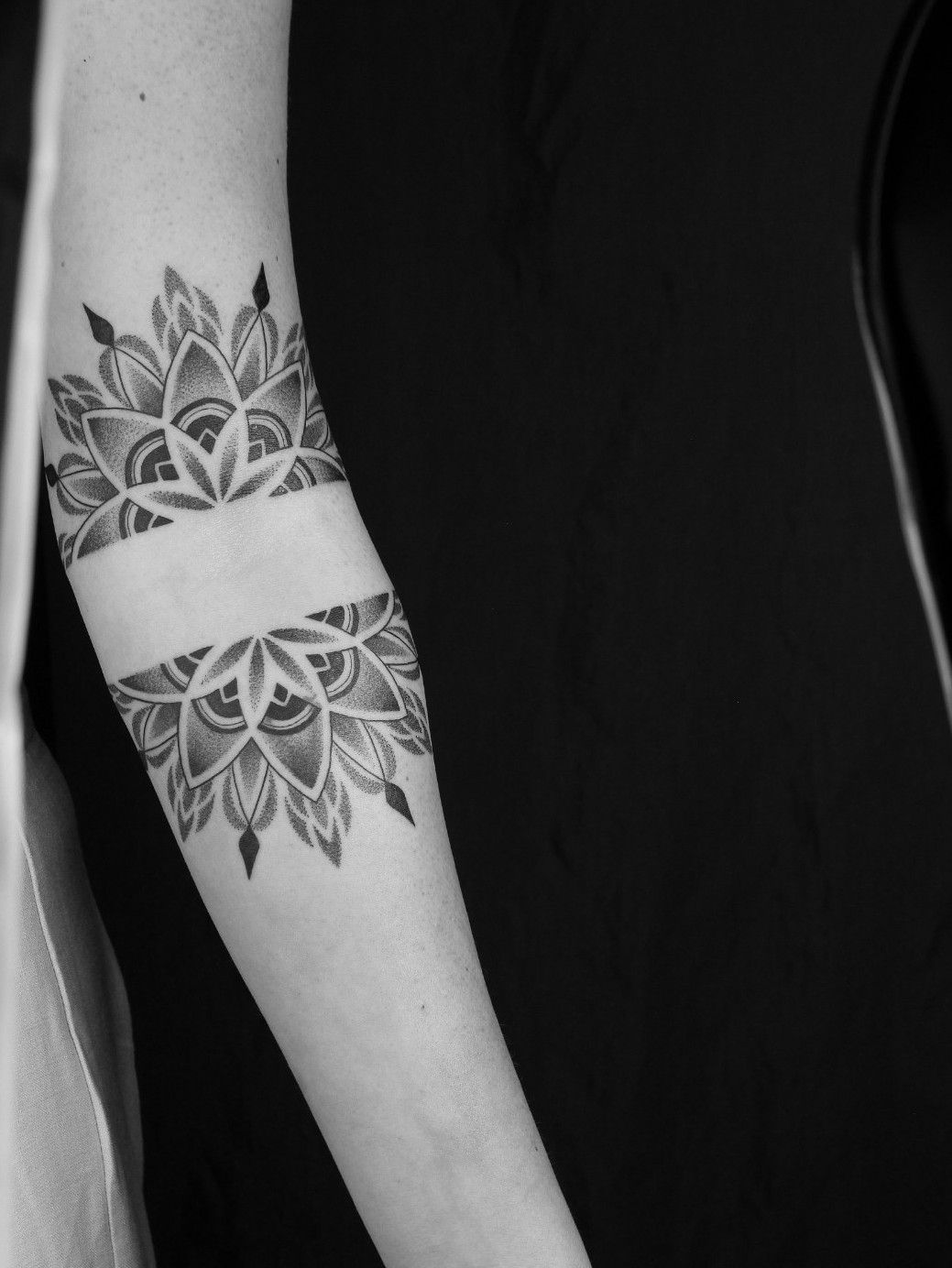 Half mandala tattoo on the forearm by Rach Ainsworth - Tattoogrid.net
