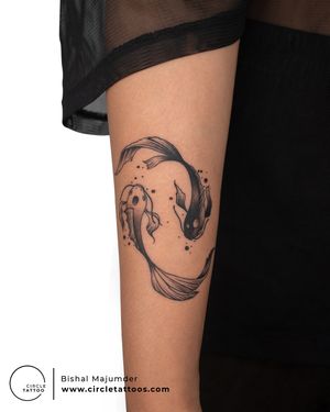 Fish Ying Yang Tattoo done by Bishal Majumder at Circle Tattoo