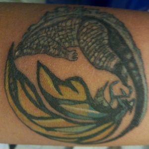 Colorful tattoo Godzilla and mothra