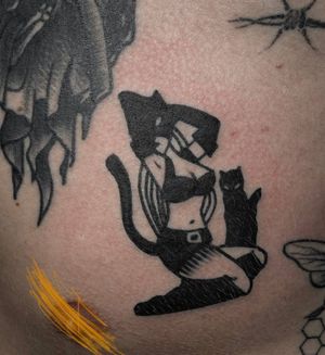 Cat woman done by @tavrov_tattoo (Gleb Tavrov)#traditional #blacktraditional