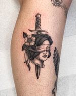 Blindfolded woman with dagger. From flash sheet. 