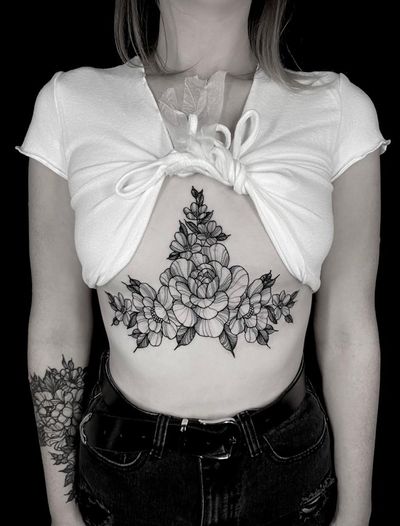 Elegant and feminine floral design featuring a beautiful peony flower, perfect for underboob placement. Created by the talented artist Lamat.