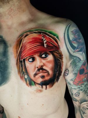 Capture the essence of Johnny Depp's iconic character with this detailed new school tattoo by Marie Terry.