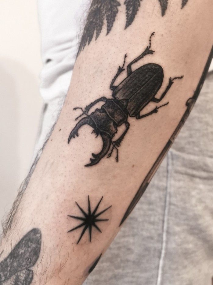 Tattoo uploaded by Vanessa Core • • healed rhino beetle • #beetle #insect # tattoo #blackworker #black_addicts #black #rhino #healed #healedtattoo •  Tattoodo