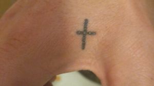 3 dots turned into cross on right hand