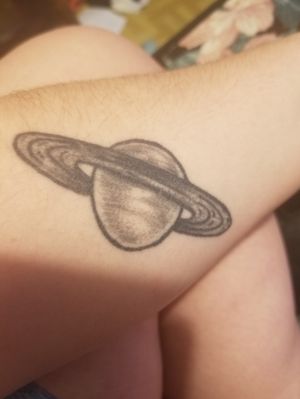 Saturn! Love this one. I plan on getting a whole galaxy sleeve with splotchy paint as the backround