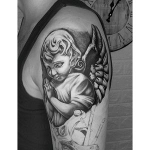 angel tattoo on shoulder
