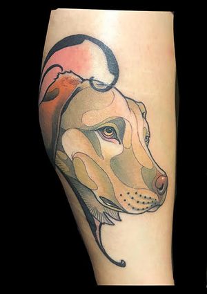 Illustrative neo traditional tattoo of a dog by Kotaro, beautifully placed on the lower leg. A timeless piece for dog lovers.