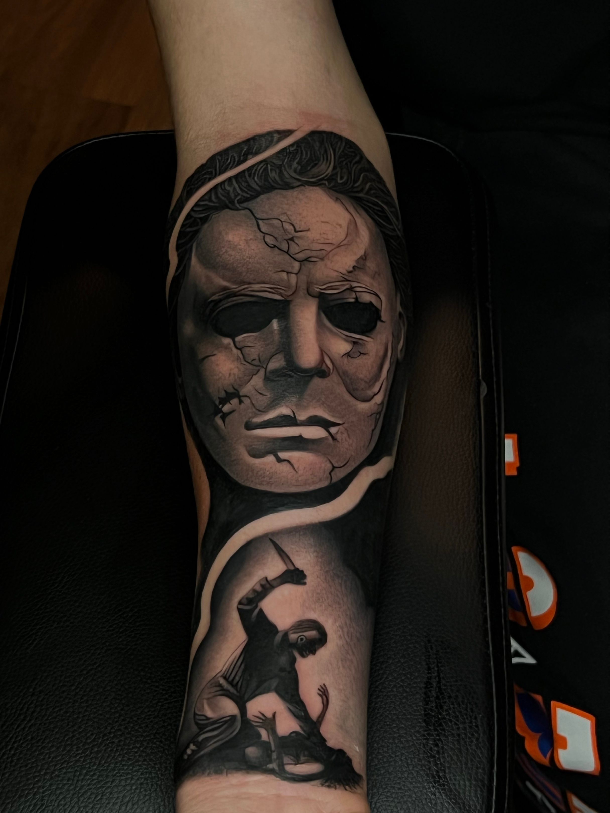 Tempting Michael Myers half sleeve tattoo examples