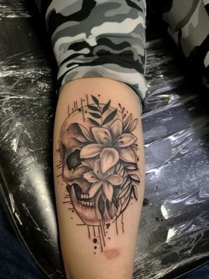 Skull flowers . Tattoo by tattoobyanthony at The Tattoo Shop in twin falls Idaho 