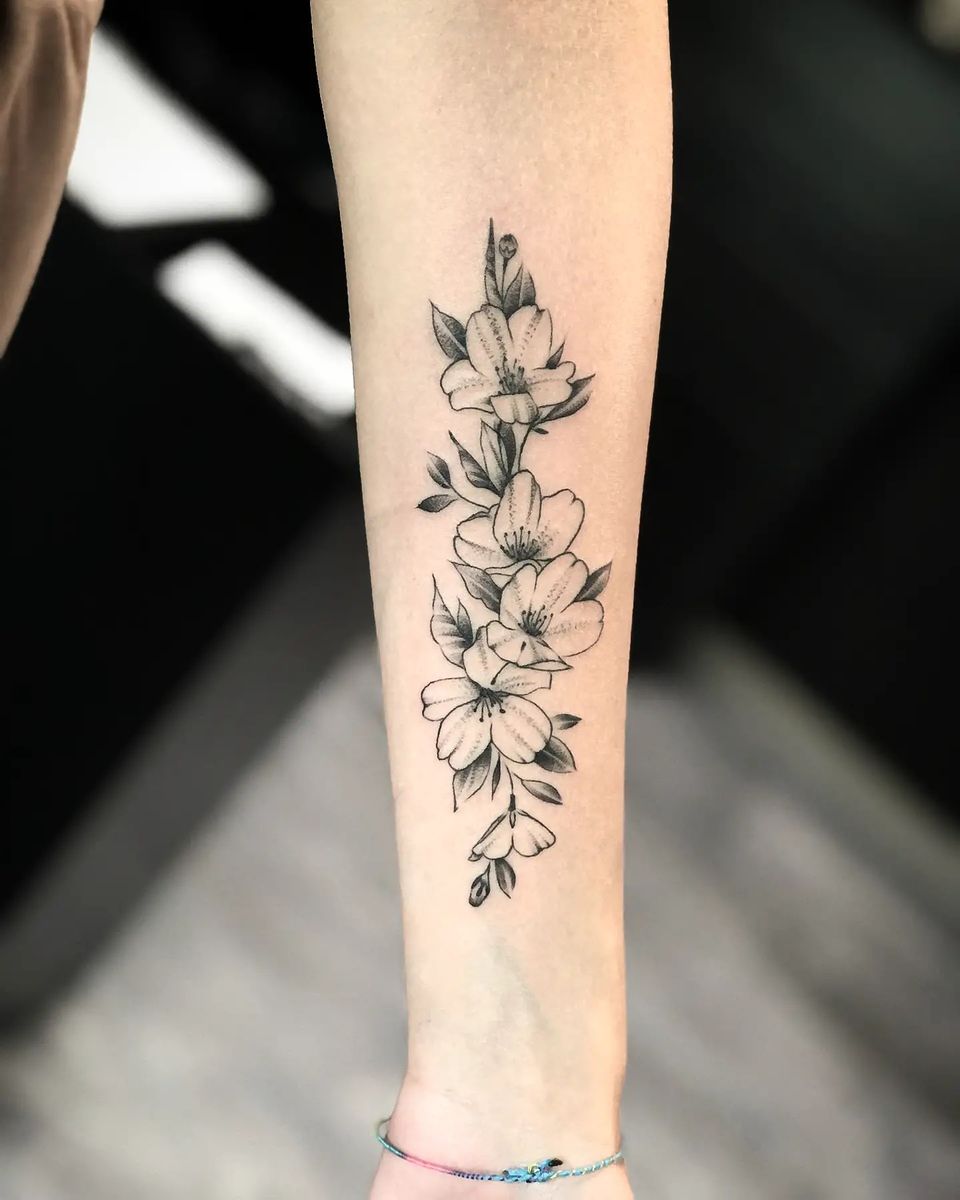 Tattoo uploaded by A Touch Of Ink • Tatuaj alb-negru cu flori A Touch ...