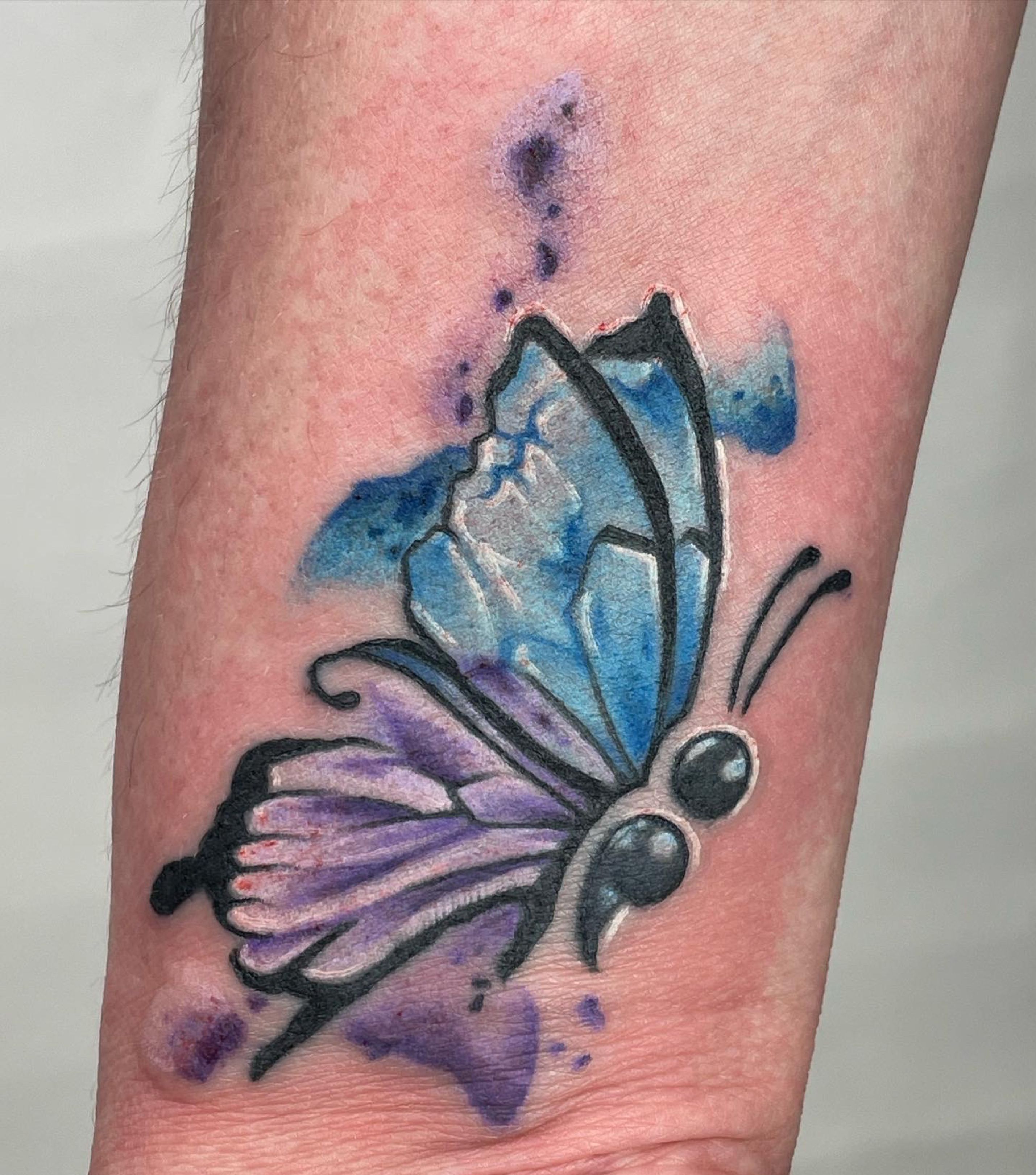 Beautiful butterfly tattoo by  Reign in Blood Tattoo Shop  Facebook