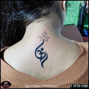 Om tattoo . . . #Omtattoo #shivaomtattoo #smalltattoo #flowertattoo #omtattoo