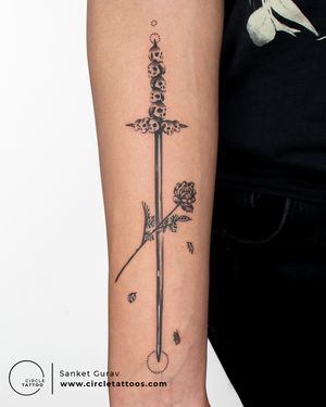 Line Art sword with rose and skull tattoo done by Sanket Gurav at Circle Tattoo