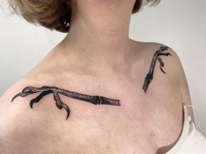 Get a fierce and unique blackwork claw tattoo on your shoulder by talented artist Sofia. Stand out with this illustrative design.