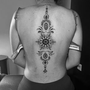 Ornamental Spine tattoo 